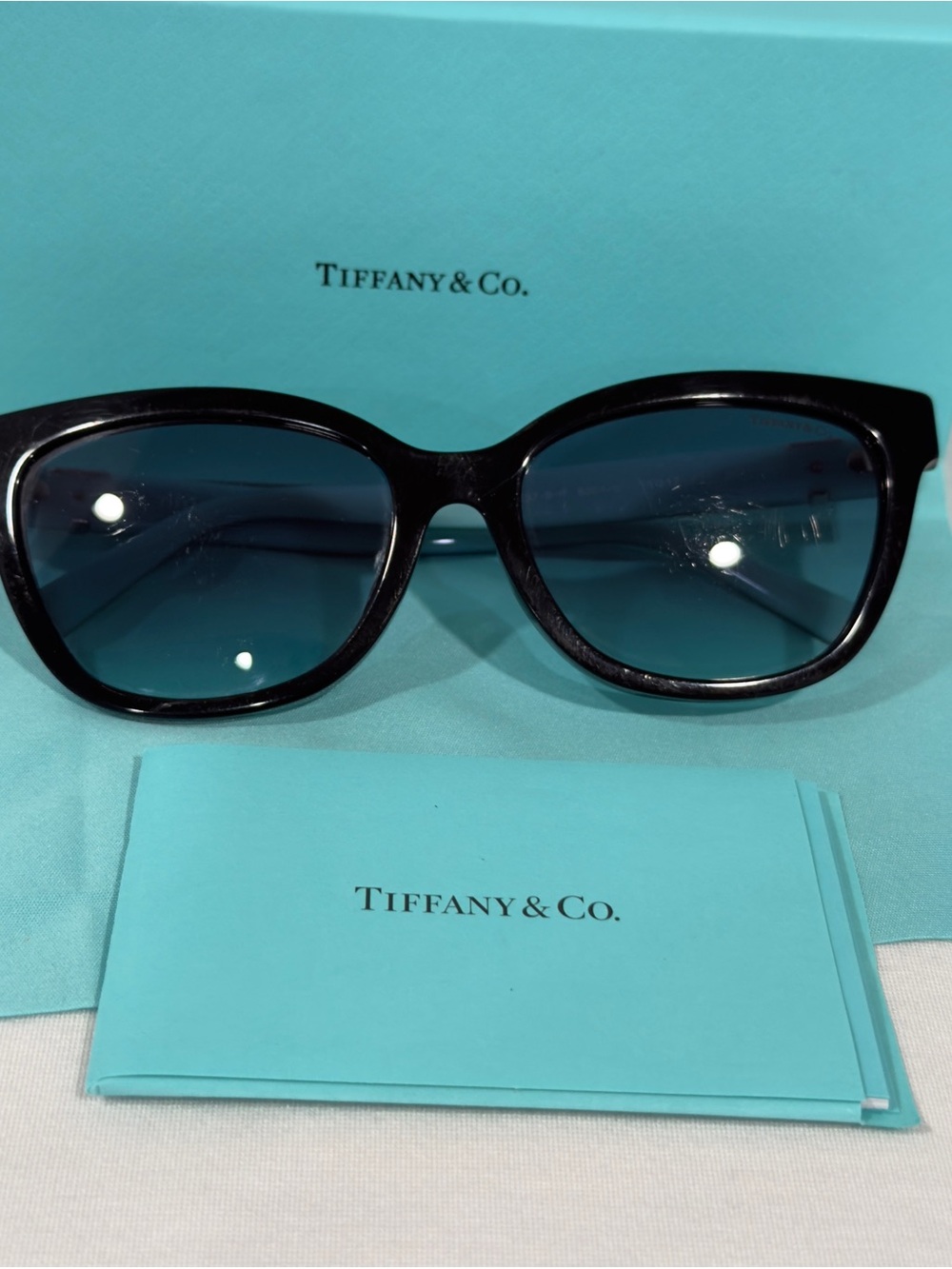 Tiffany & Co. Black Frame Sunglasses with Blue-Tinted Lenses